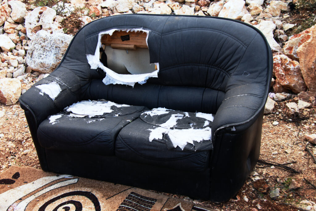 Old, torn up sofa